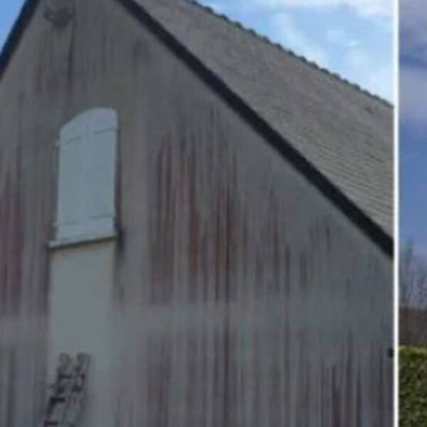 Façade tachée et noircie par l’humidité avant nettoyage
